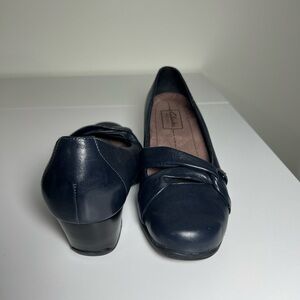 Clark’s navy pumps